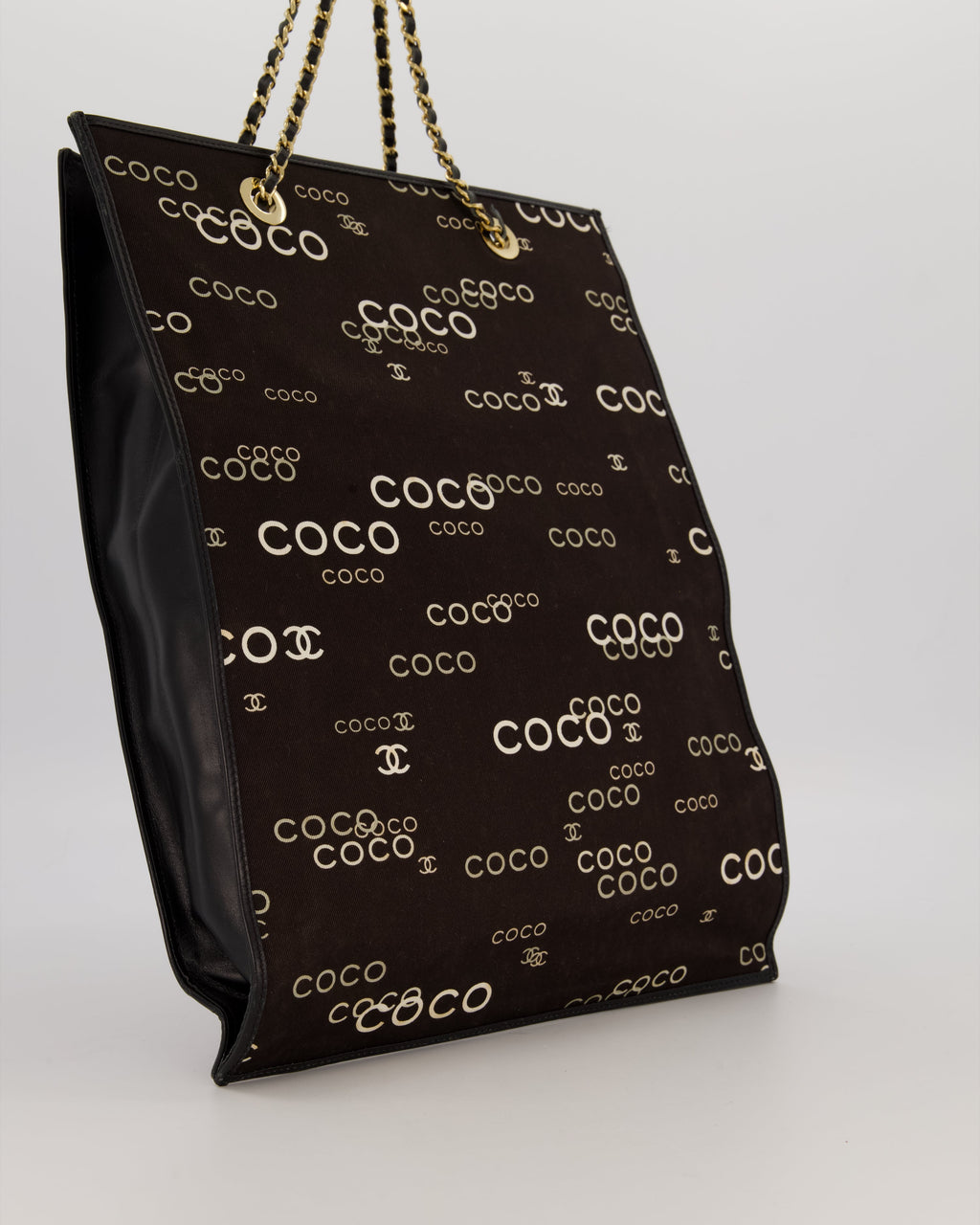 Chanel Vintage Black Canvas Coco Tote Bag with Monogram Details and Gold Hardware