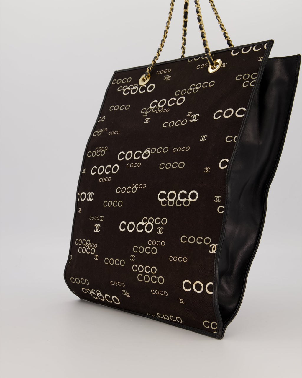 Chanel Vintage Black Canvas Coco Tote Bag with Monogram Details and Gold Hardware