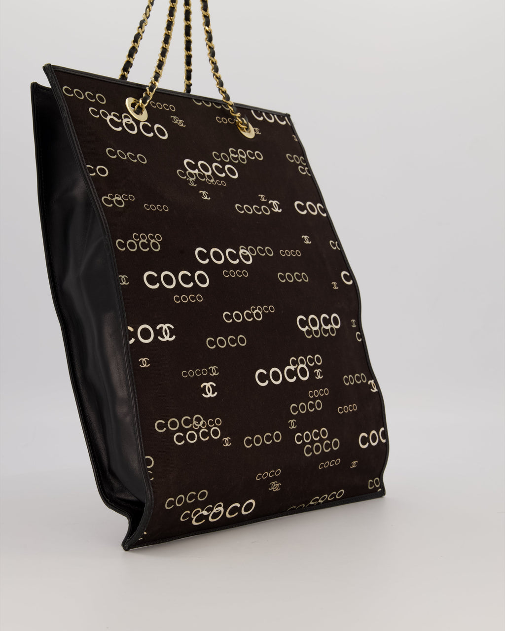 Chanel Vintage Black Canvas Coco Tote Bag with Monogram Details and Gold Hardware