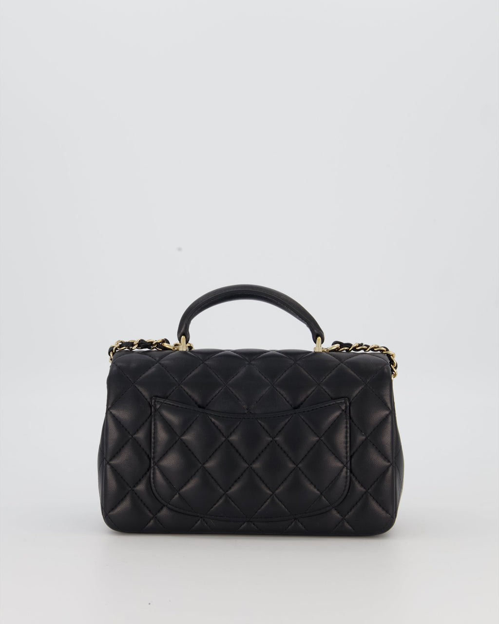 Chanel Black Mini Rectangular Top Handle Flap Bag in Lambskin Leather with Champagne Hardware and Strass Removable Bow Charm