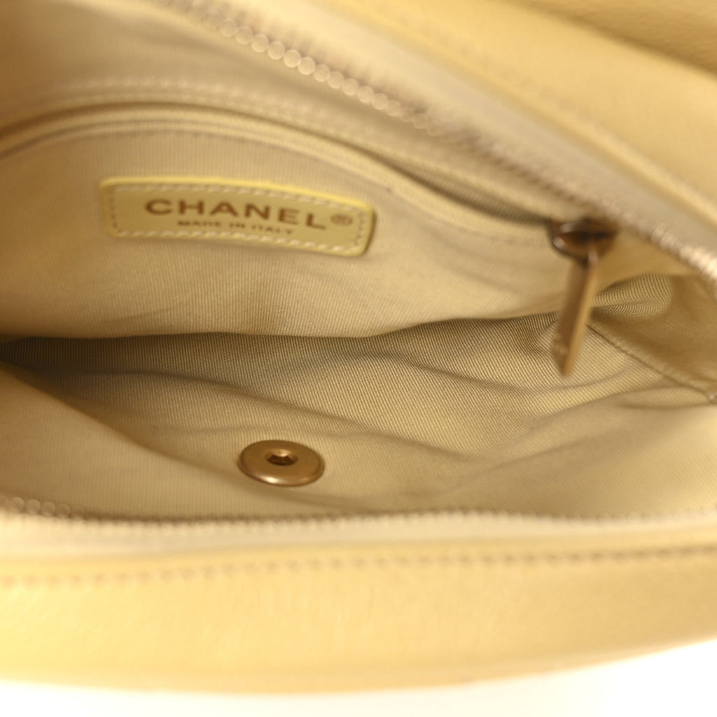 Chanel Shiny Caviar Quilted Chain Melody Backpack Yellow