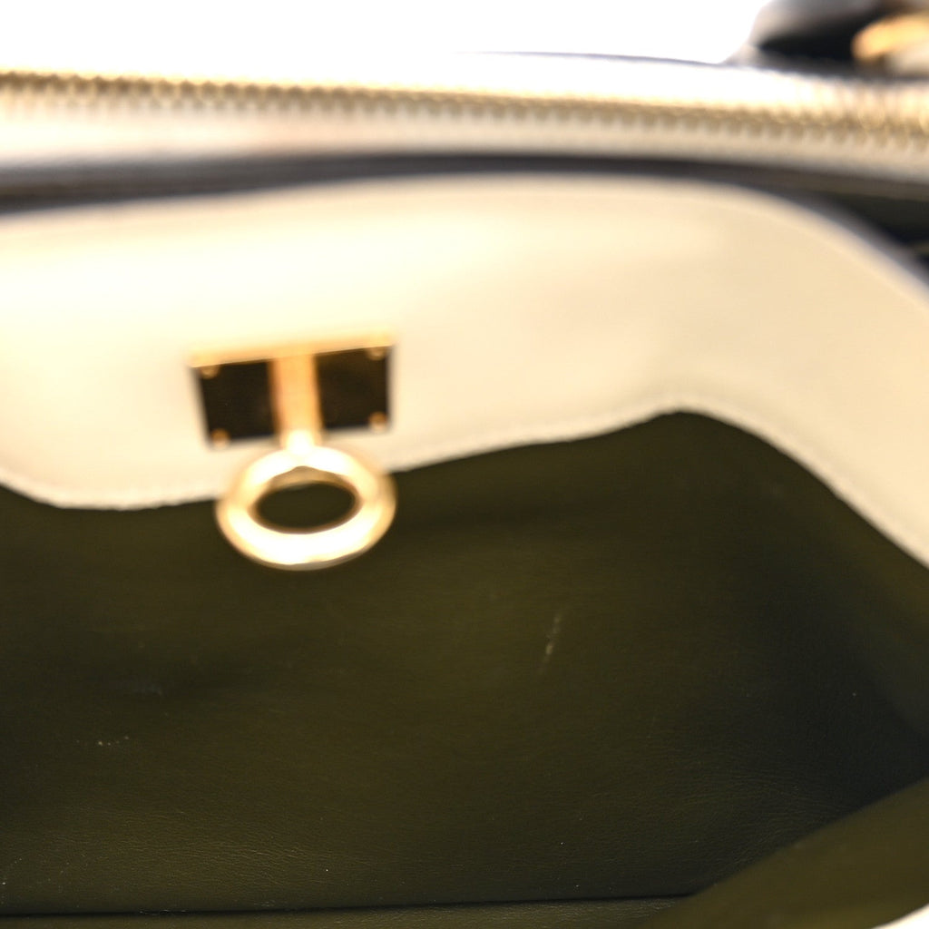 Louis Vuitton Taurillon City Steamer MM Kaki Creme Black