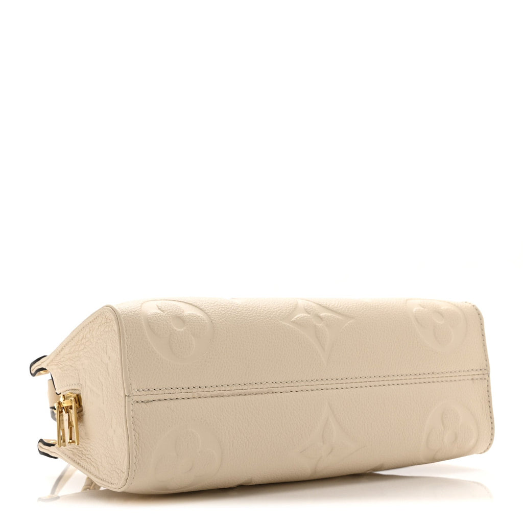 Louis Vuitton Empreinte Monogram Giant OnTheGo East West Creme