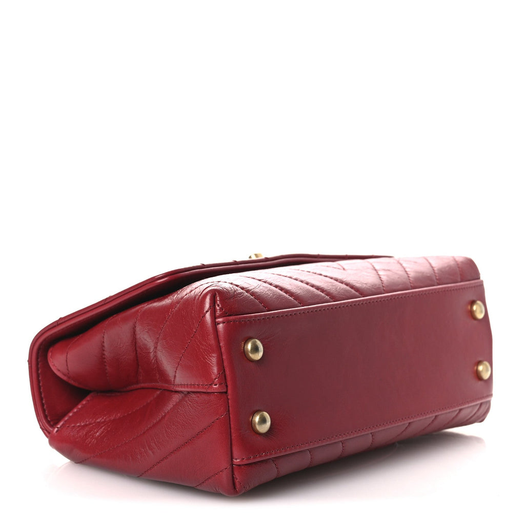 Chanel Aged Calfskin Chevron Quilted Mini Coco Handle Flap Red