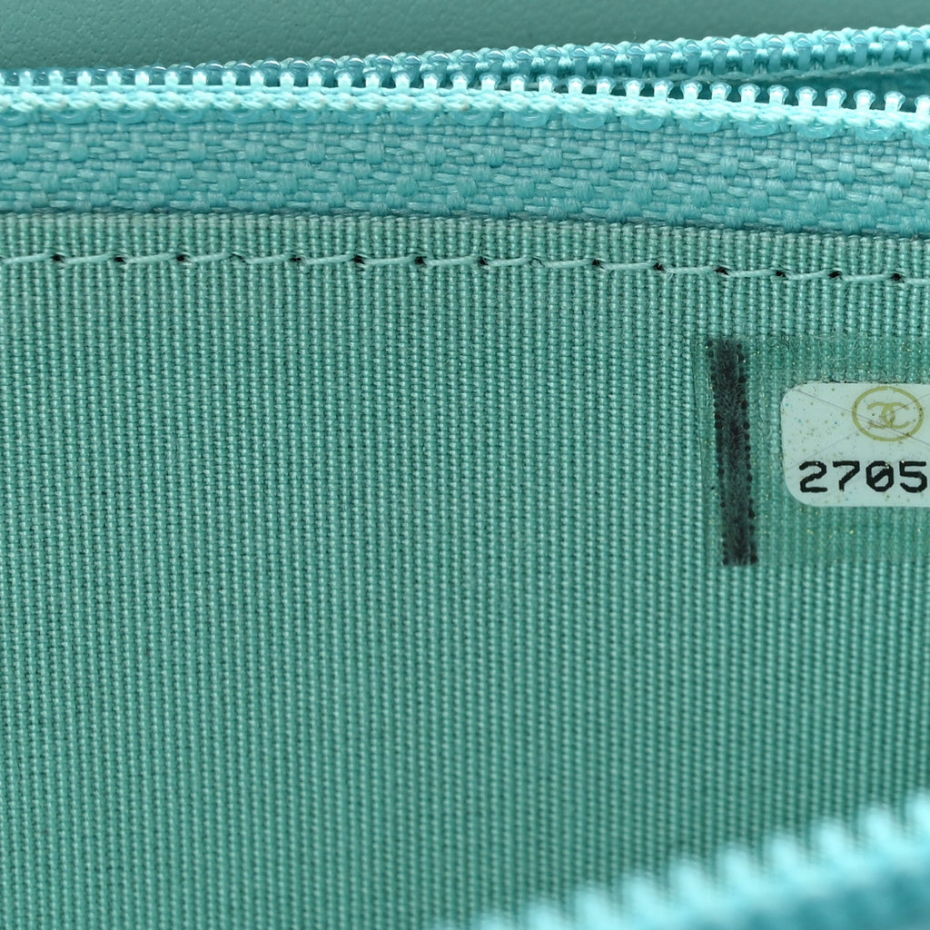 Caviar Quilted Small Boy Zip Around Wallet Light Blue