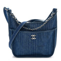 Chanel Denim Quilted Jungle Stroll Hobo Bag Blue