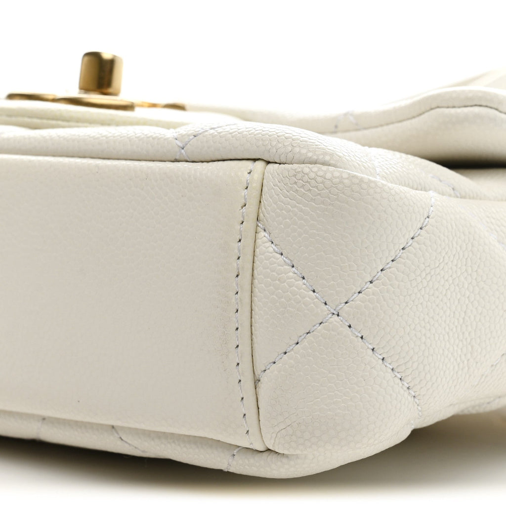 Chanel Caviar Quilted Mini Twist Your Buttons Flap  White