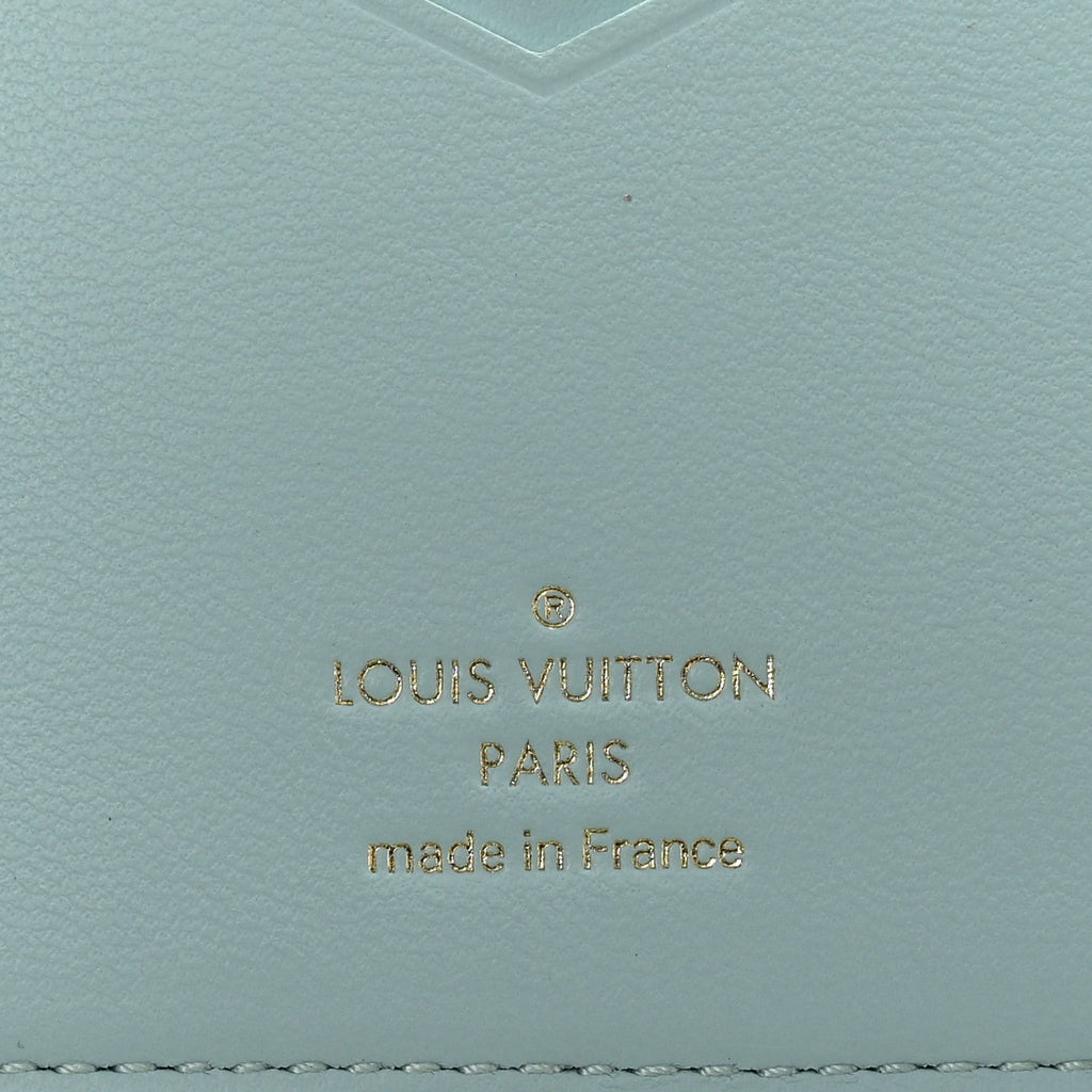 Louis Vuitton Taurillon LV Vertical Capucines Wallet Galet Aquamarine