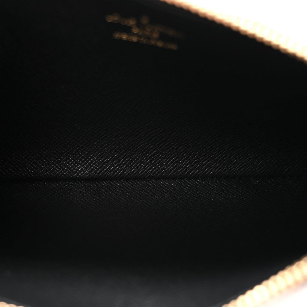 Louis Vuitton Reverse Monogram Giant Trio Pouch
