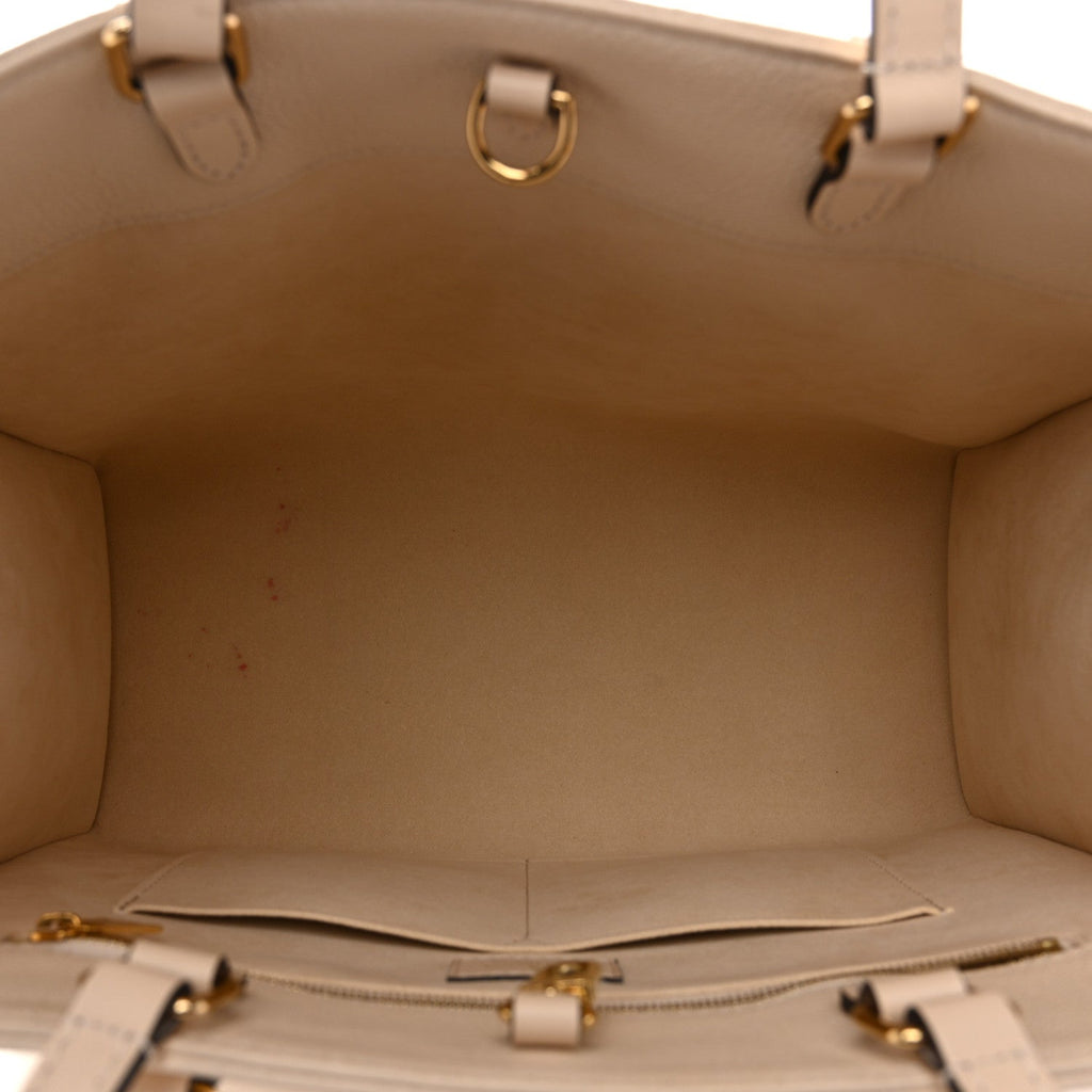 Louis Vuitton Empreinte Monogram Giant Onthego MM Creme