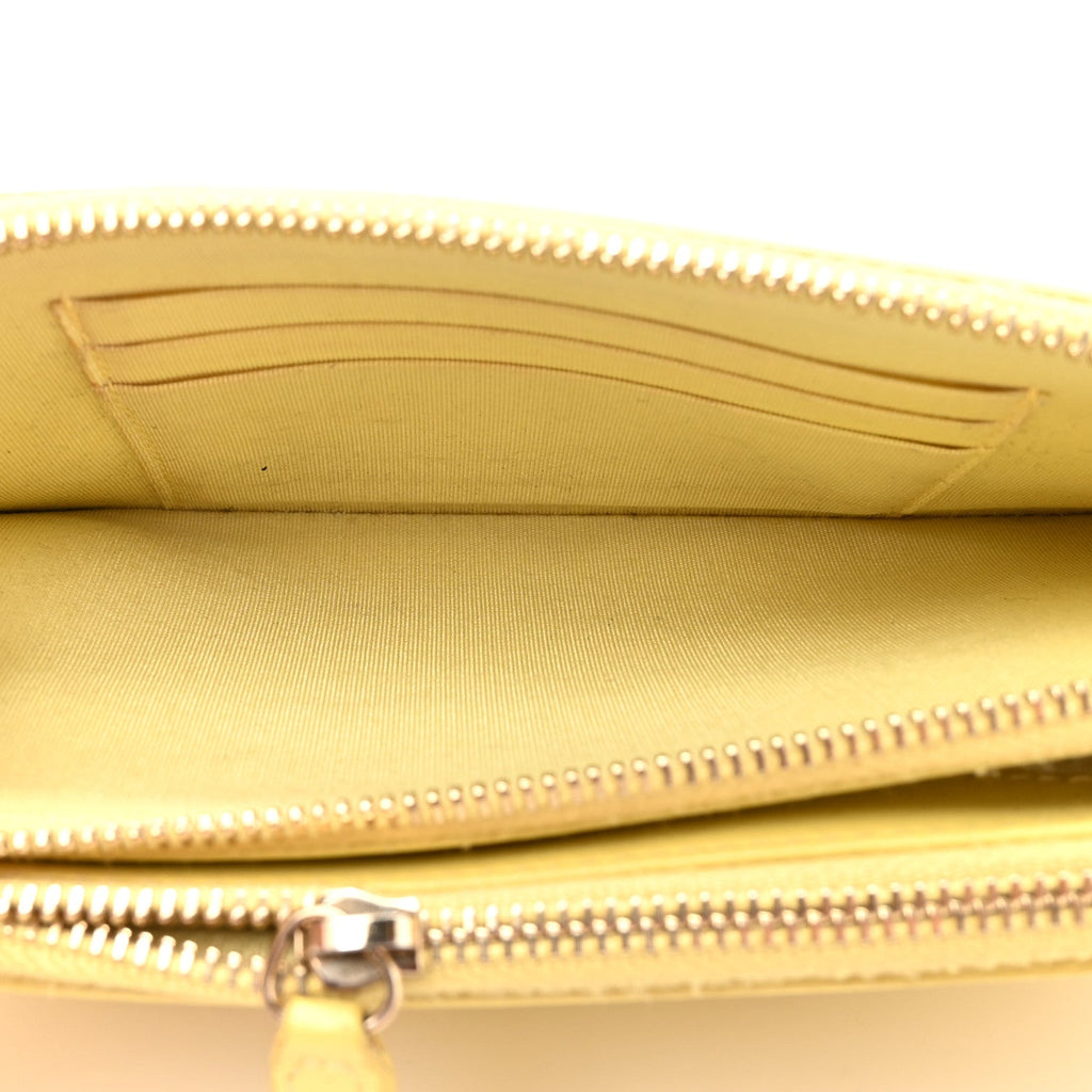 Chanel Caviar Quilted CC Filigree Clutch With Chain Yellow