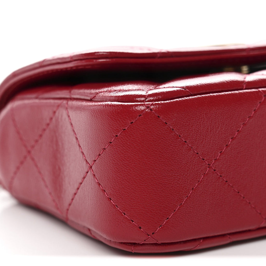Chanel Shiny Lambskin Quilted Mini Metal Top Handle Clutch With Chain  Red