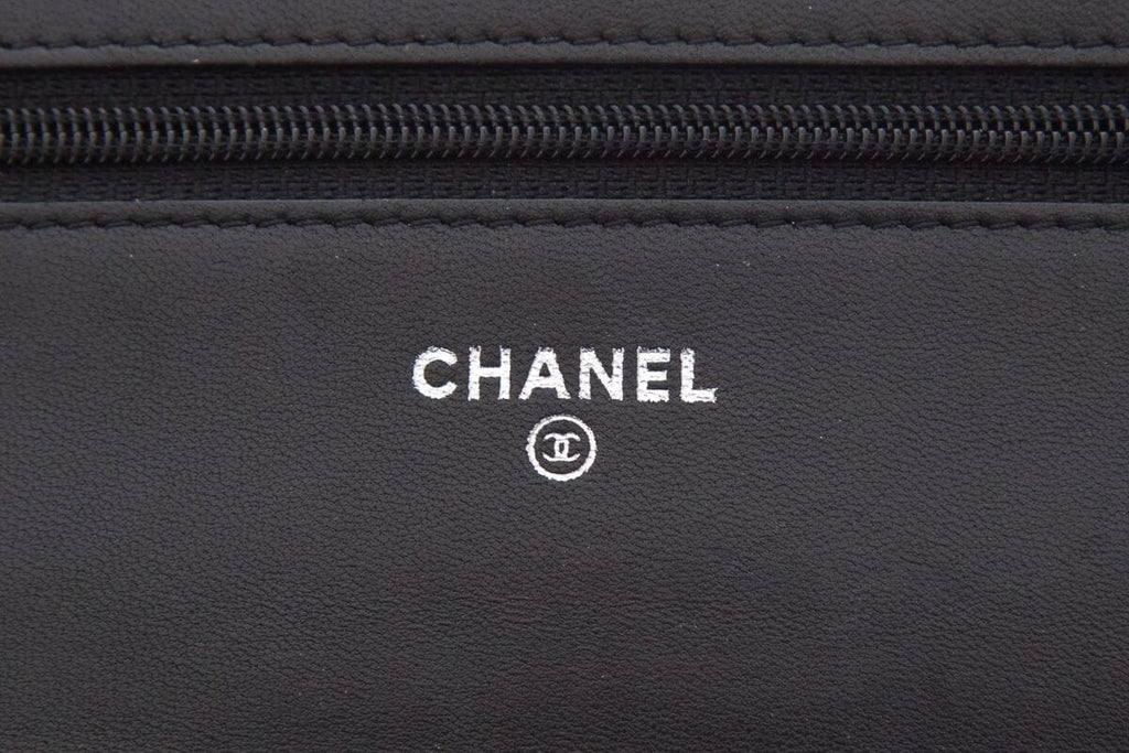 Chanel Black Calfskin Camellia Embossed Leather Cross-Body
