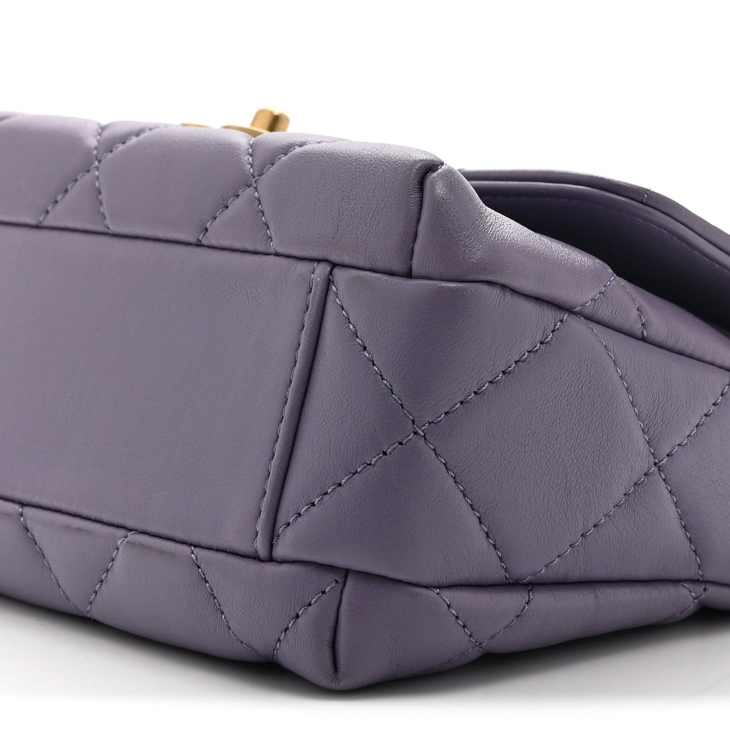 Chanel Shiny Lambskin Quilted Mini Pearl Logo Flap Light Purple
