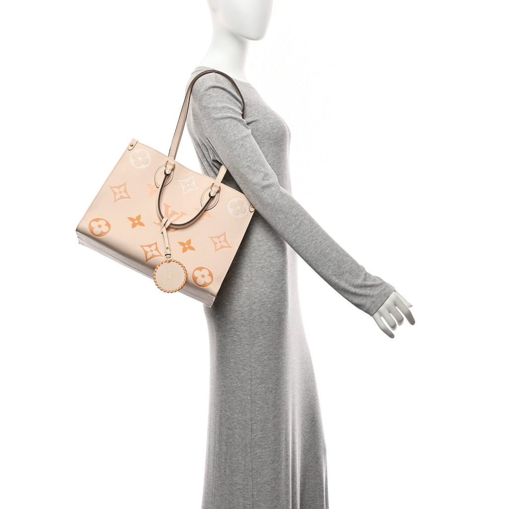 Louis Vuitton Empreinte Monogram Giant By The Pool Onthego MM Cream Saffron