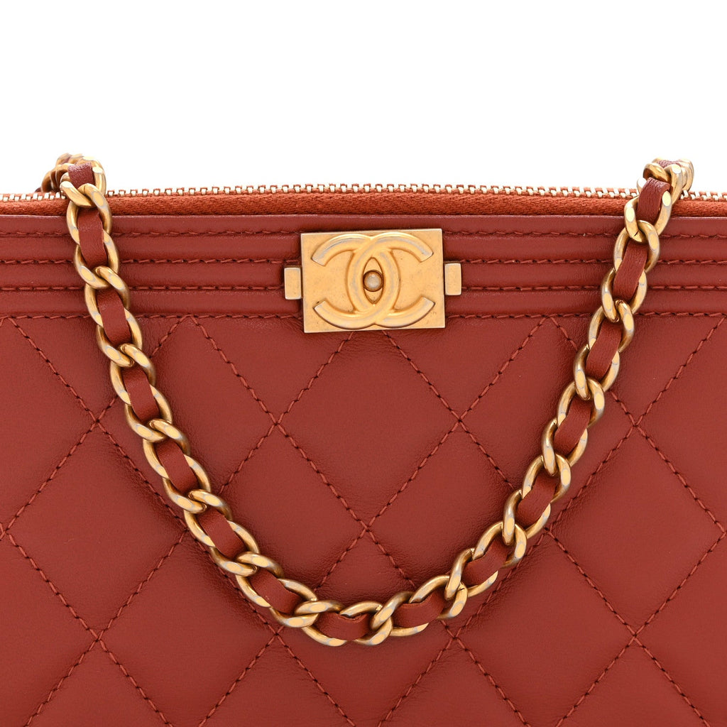 Chanel Lambskin Quilted Small Boy Clutch With Chain Orange