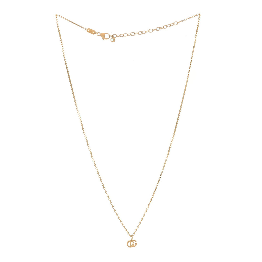 Gucci 18K Yellow Gold Blue Topaz Running G Pendant Necklace