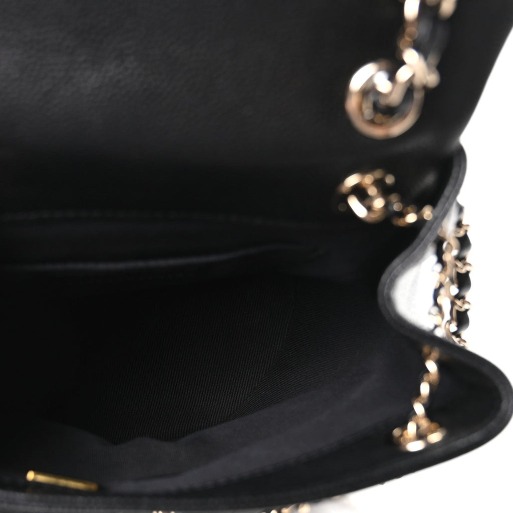 Chanel Shiny Caviar Quilted Medium Duma Pockets Drawstring Backpack Black