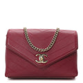 Chanel Calfskin Chevron Stitched Coco Waist Bag Red