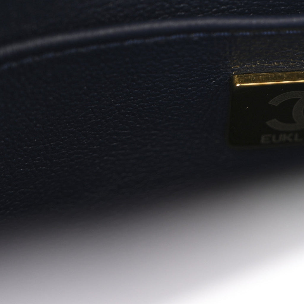 Chanel Shiny Caviar Quilted Mini Top Handle Flap Navy Blue
