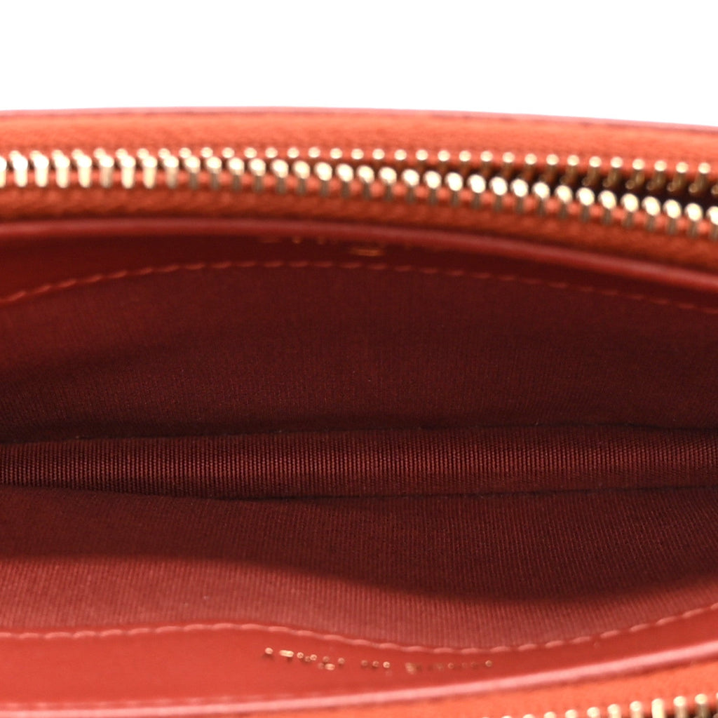 Chanel Lambskin Quilted Small Boy Clutch With Chain Orange