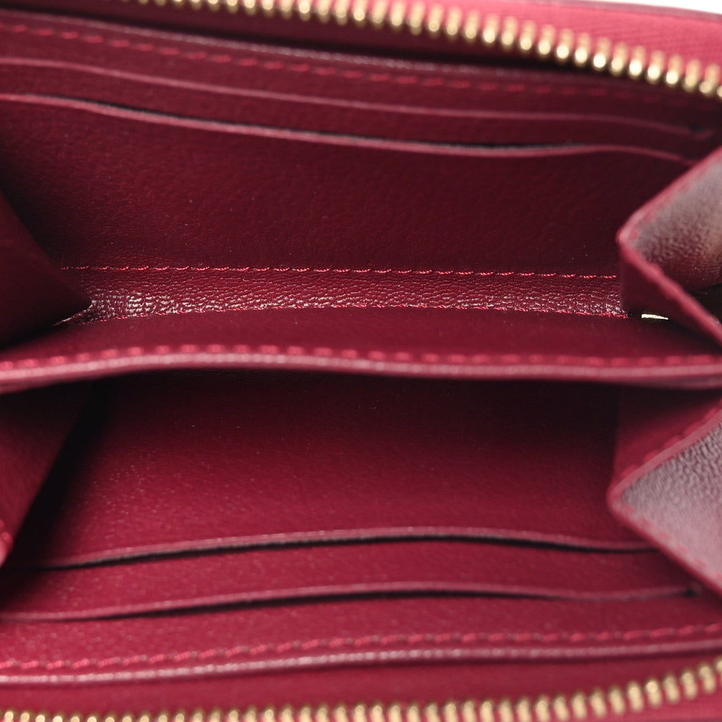 Louis Vuitton Ostrich Zippy Coin Purse Magenta