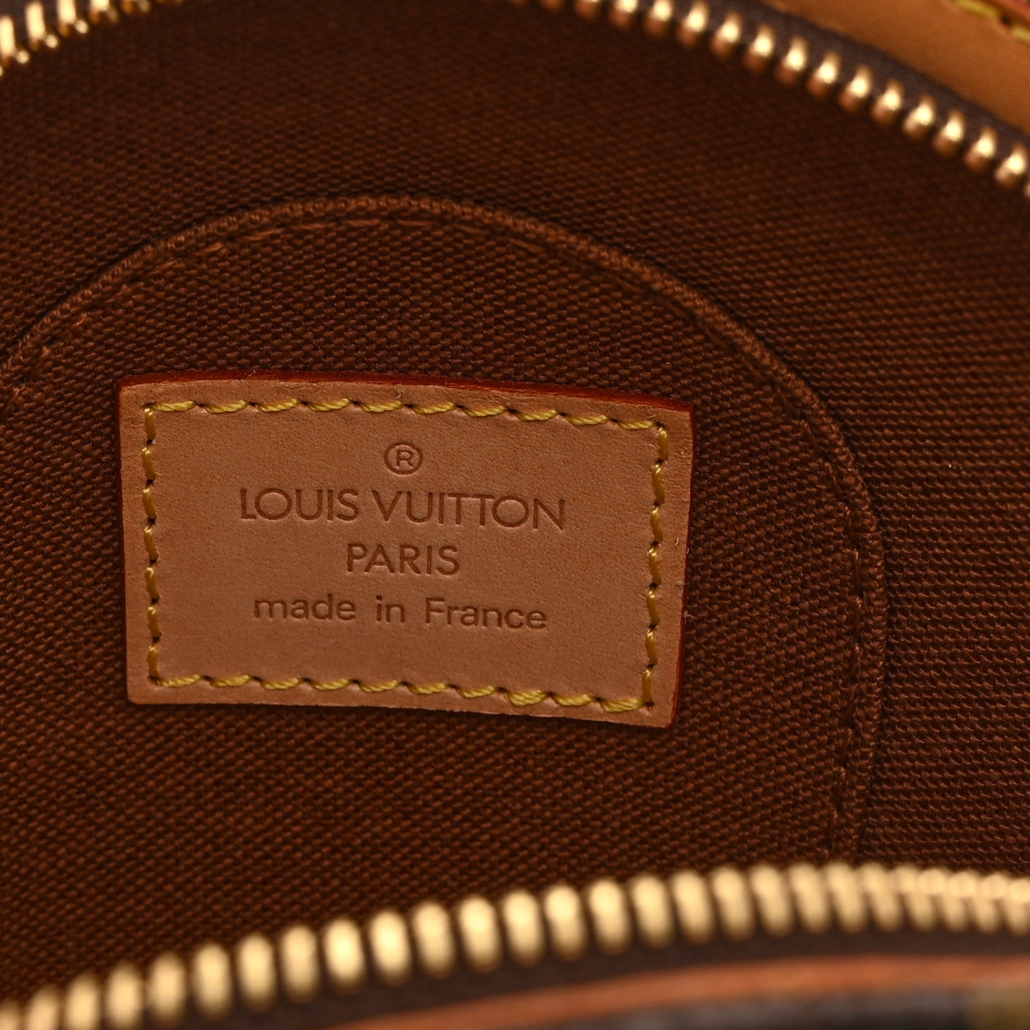 Louis Vuitton Monogram Mini Ellipse Wristlet Clutch