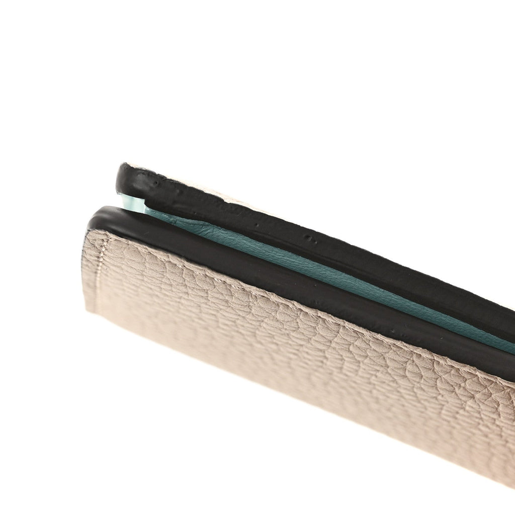 Louis Vuitton Taurillon LV Vertical Capucines Wallet Galet Aquamarine