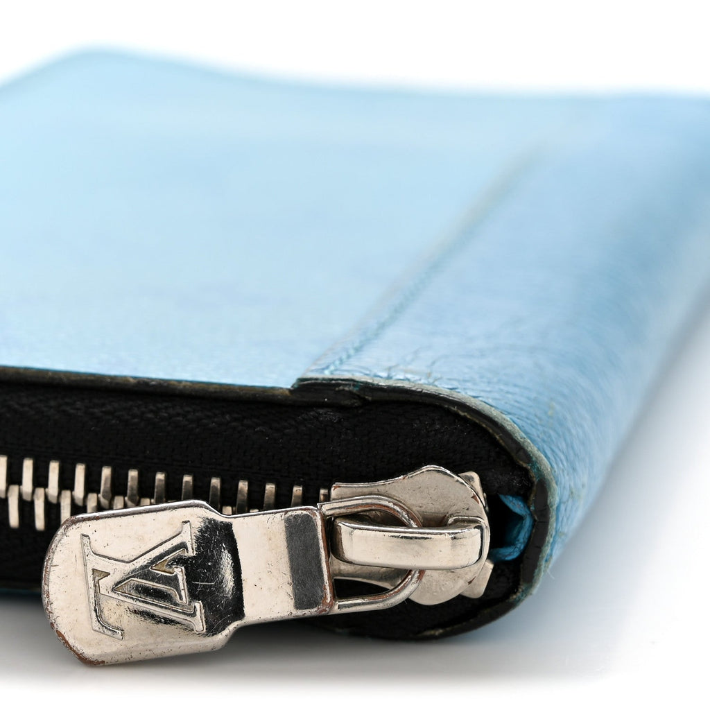 Louis Vuitton Taigarama Vertical Zippy Wallet Blue Lagoon