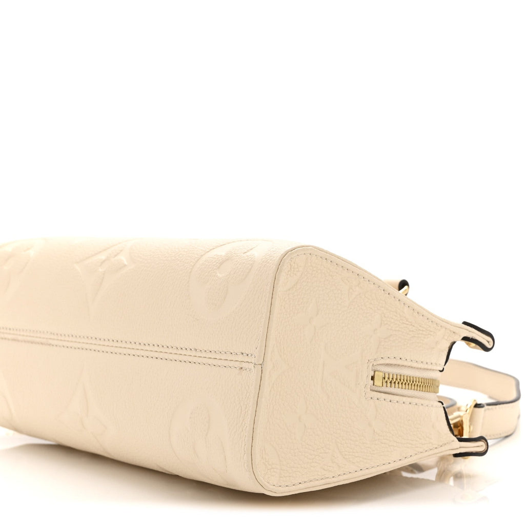 Louis Vuitton Empreinte Monogram Giant OnTheGo East West Creme
