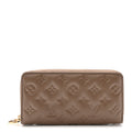 Louis Vuitton Lambskin Embossed Monogram Coussin Zippy Wallet Taupe