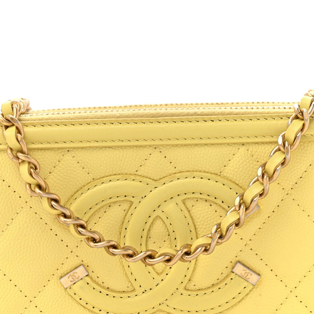 Chanel Caviar Quilted CC Filigree Clutch With Chain Yellow
