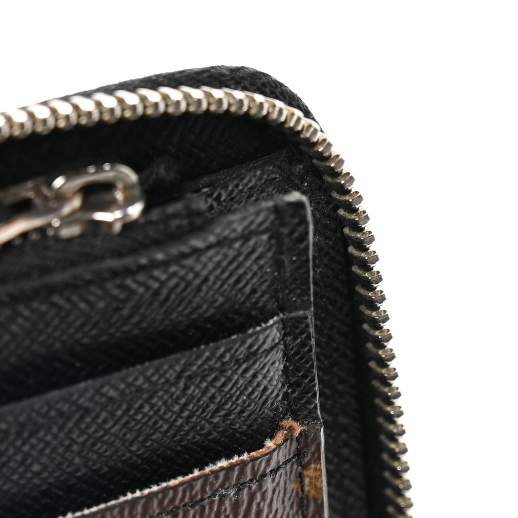 Louis Vuitton Monogram Macassar Vertical Zippy Wallet