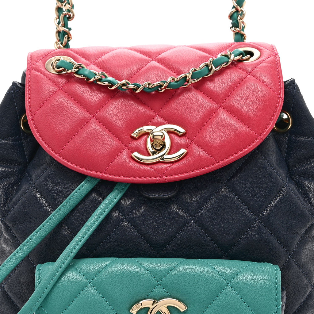 Chanel Goatskin Quilted Duma Drawstring Backpack Navy Turquoise Pink