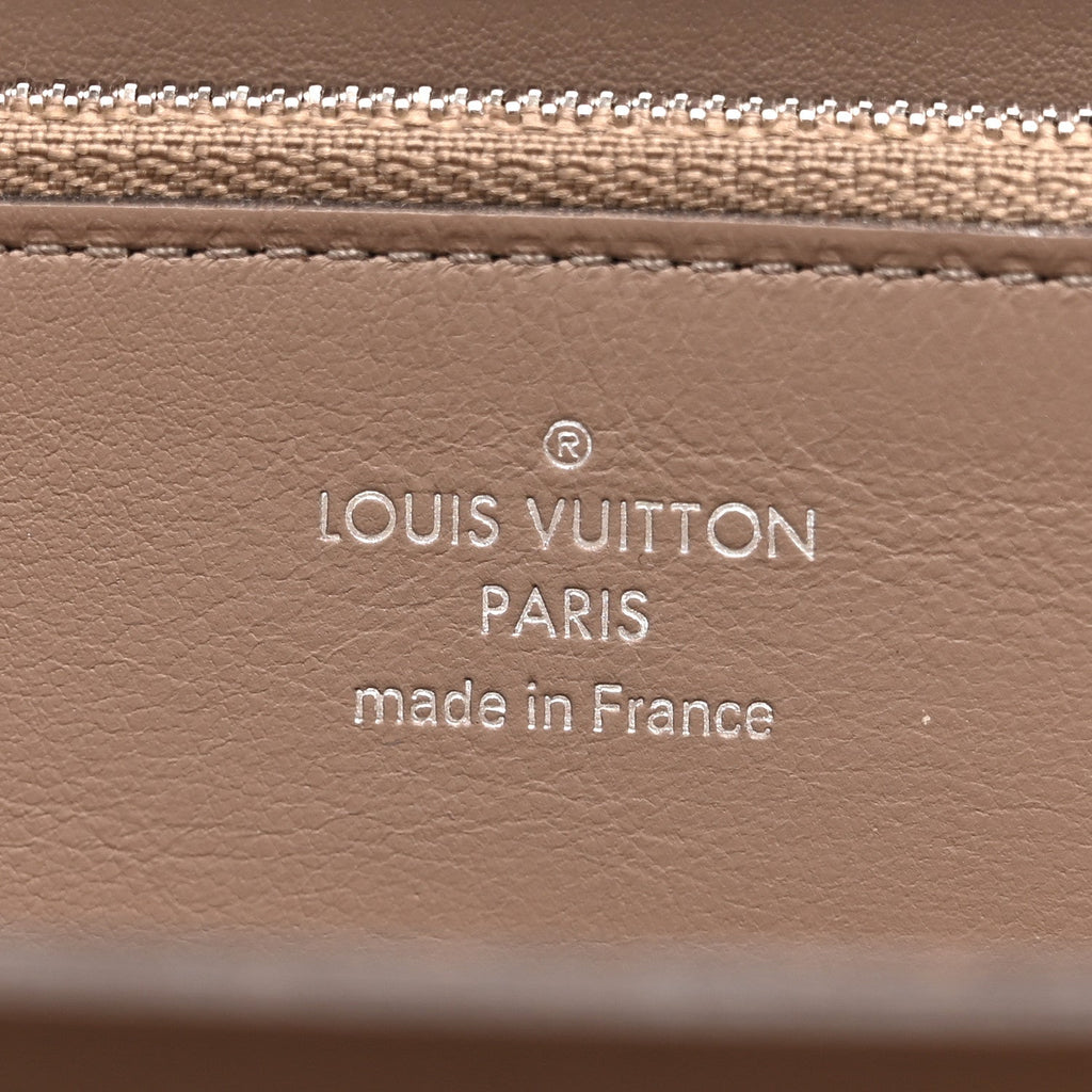 Louis Vuitton Veau Cachemire Comete Wallet Magnolia