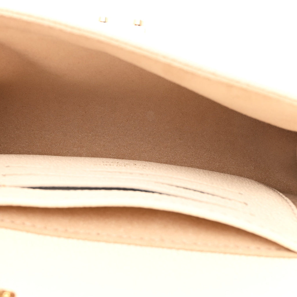 Louis Vuitton Empreinte Monogram Nano Madeleine Creme