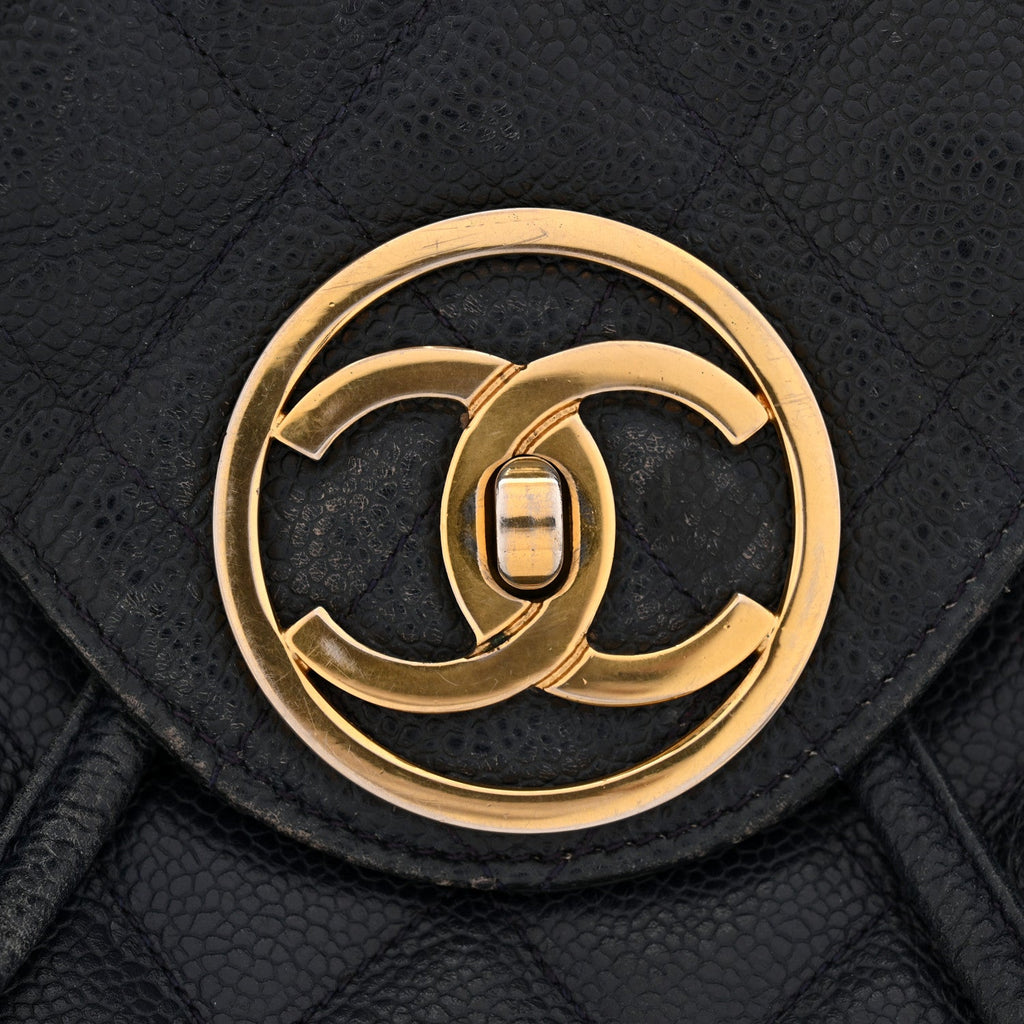 Chanel Caviar Quilted CC Drawstring Backpack Navy