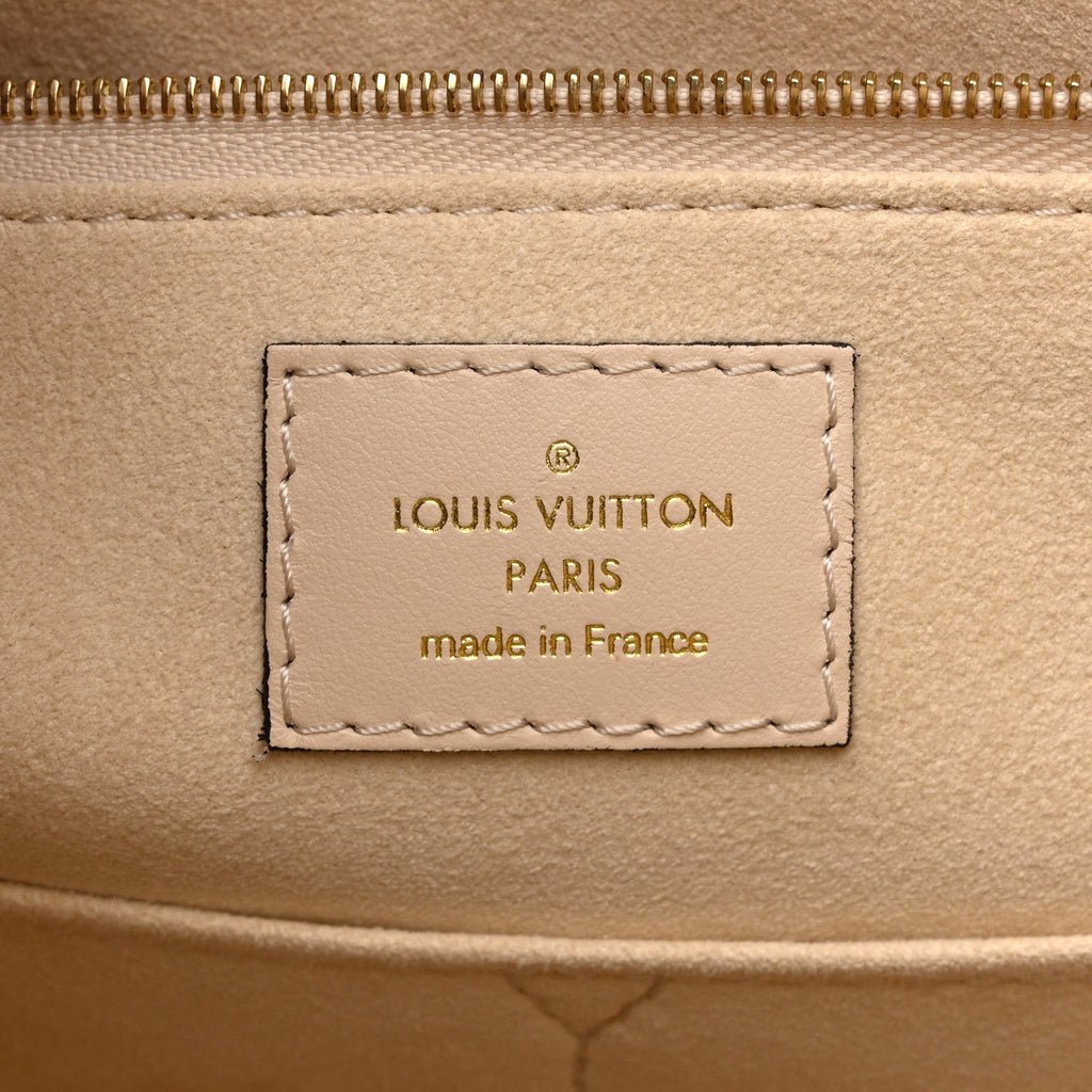 Louis Vuitton Empreinte Monogram Giant Onthego MM Creme