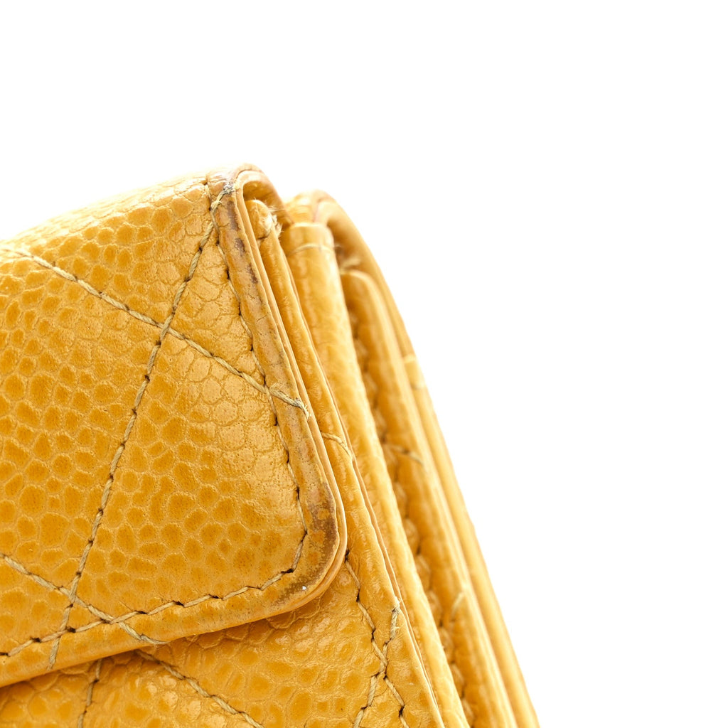 Caviar Quilted Double Flap Wallet Yellow
