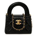 Chanel Shiny Aged Calfskin Quilted Mini Nano Kelly Shopper Black
