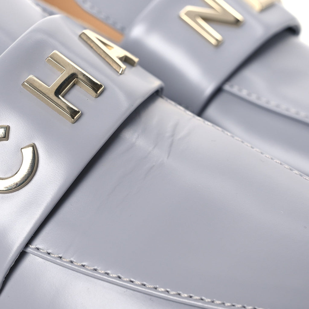 Chanel Shiny Calfskin Logo Loafers 37 Light Grey