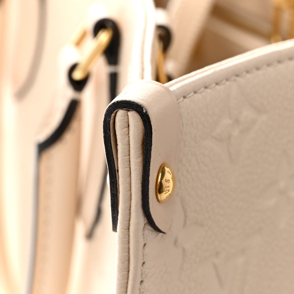 Louis Vuitton Empreinte Monogram Giant Onthego MM Creme