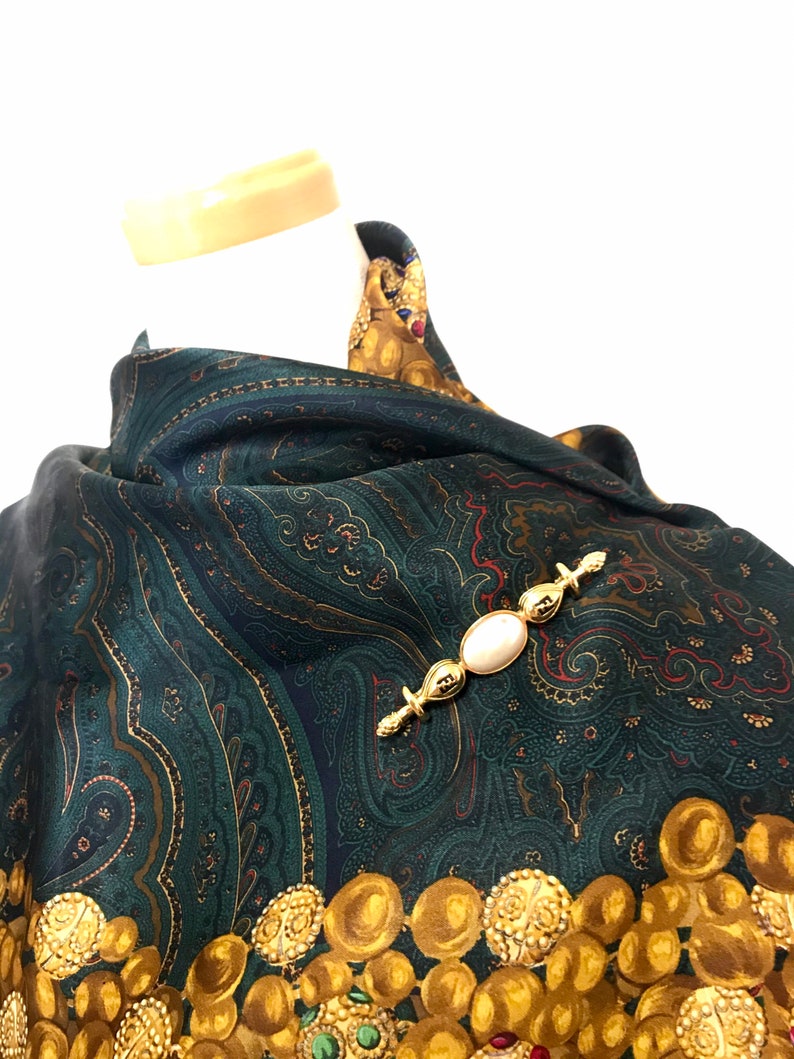 FENDI Vintage gold tone hat pin with white oval faux pearl and FF mark
