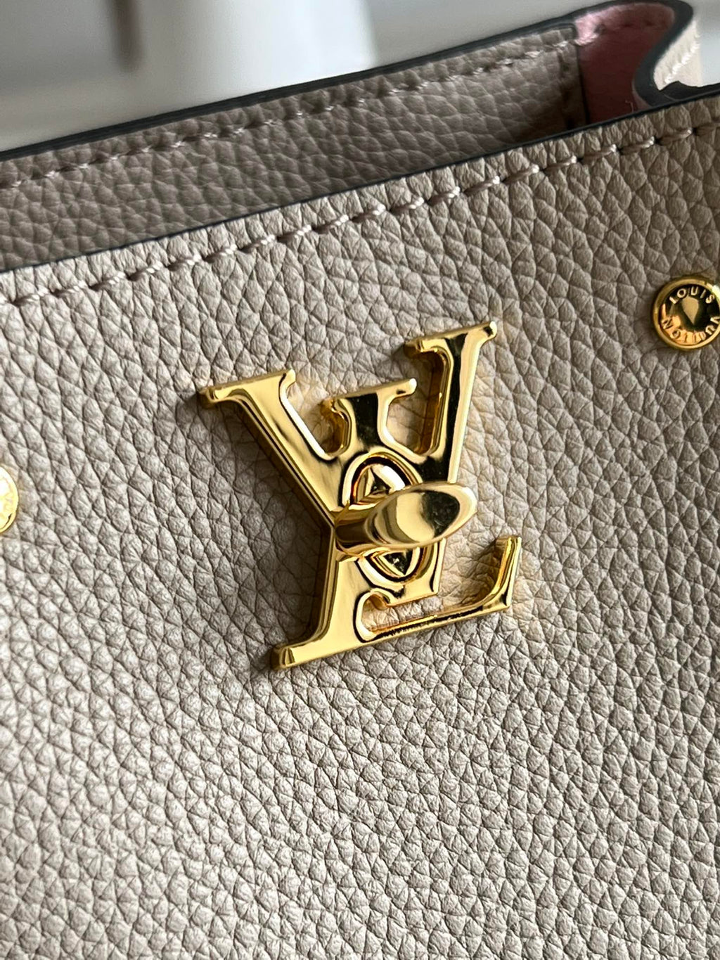 Louis Vuitton Nano LockMe Bucket Bag