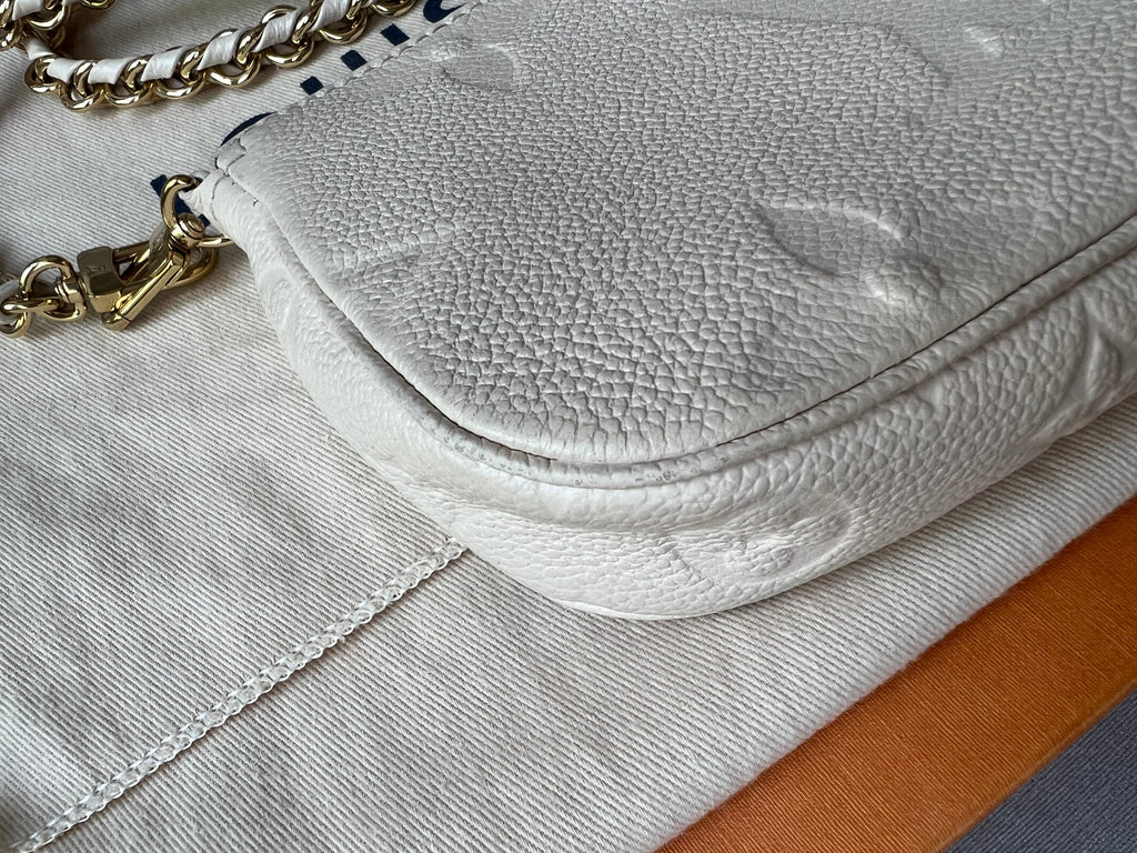 Louis Vuitton Multi Pochette Accessoires Creme Empreinte (RRP £2110)