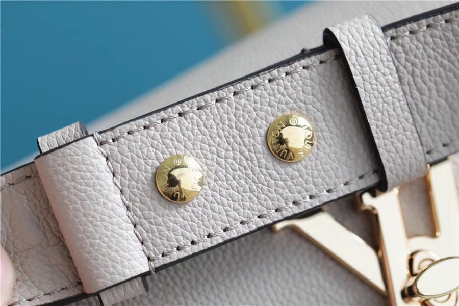 Louis Vuitton LockMe Tender Bag