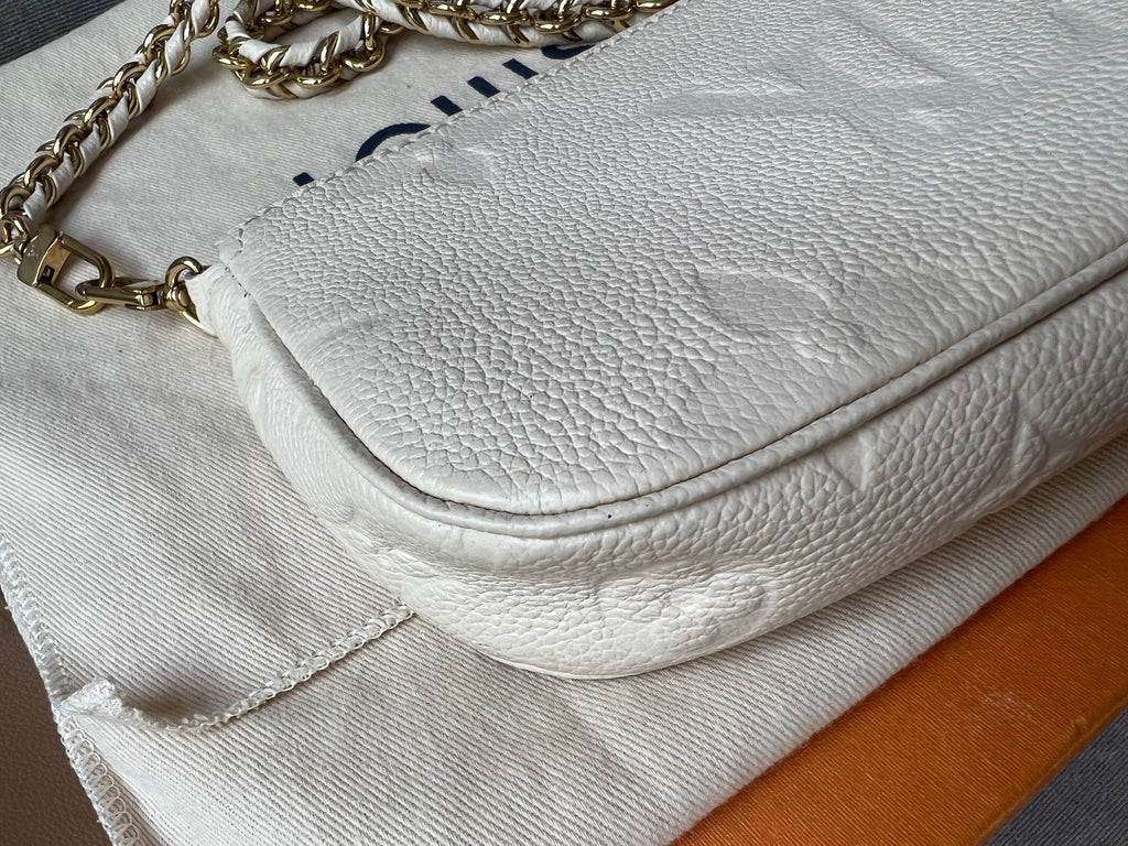 Louis Vuitton Multi Pochette Accessoires Creme Empreinte (RRP £2110)
