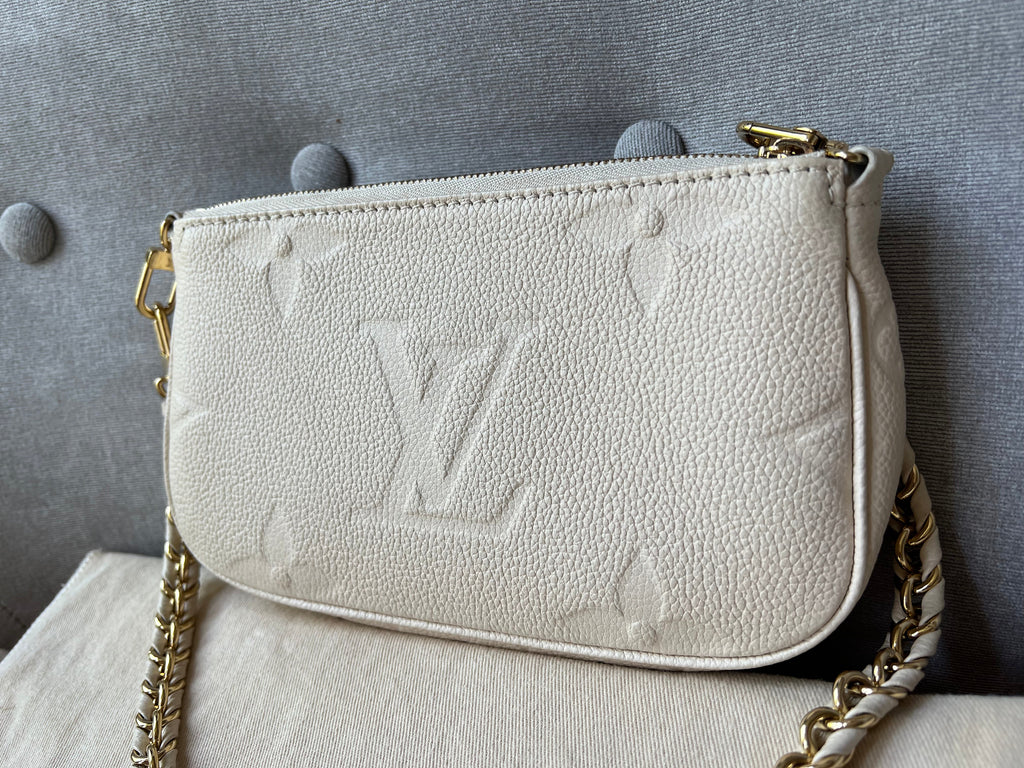Louis Vuitton Multi Pochette Accessoires Creme Empreinte (RRP £2110)