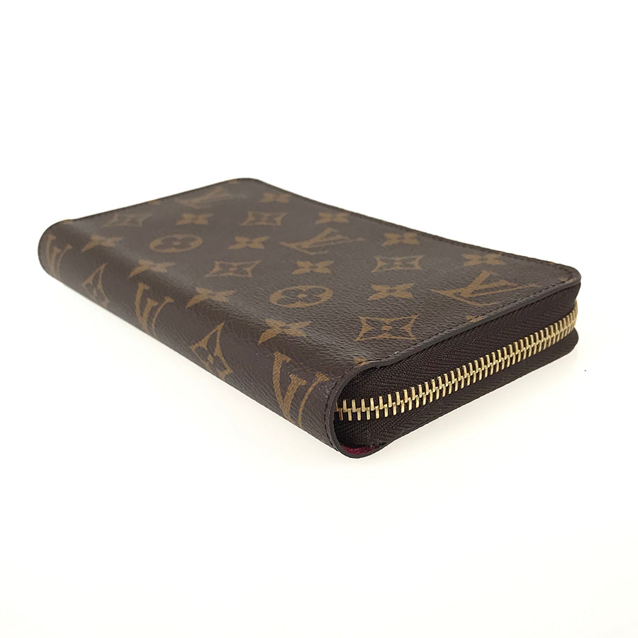 LOUIS VUITTON Fuchsia purse Zip Around