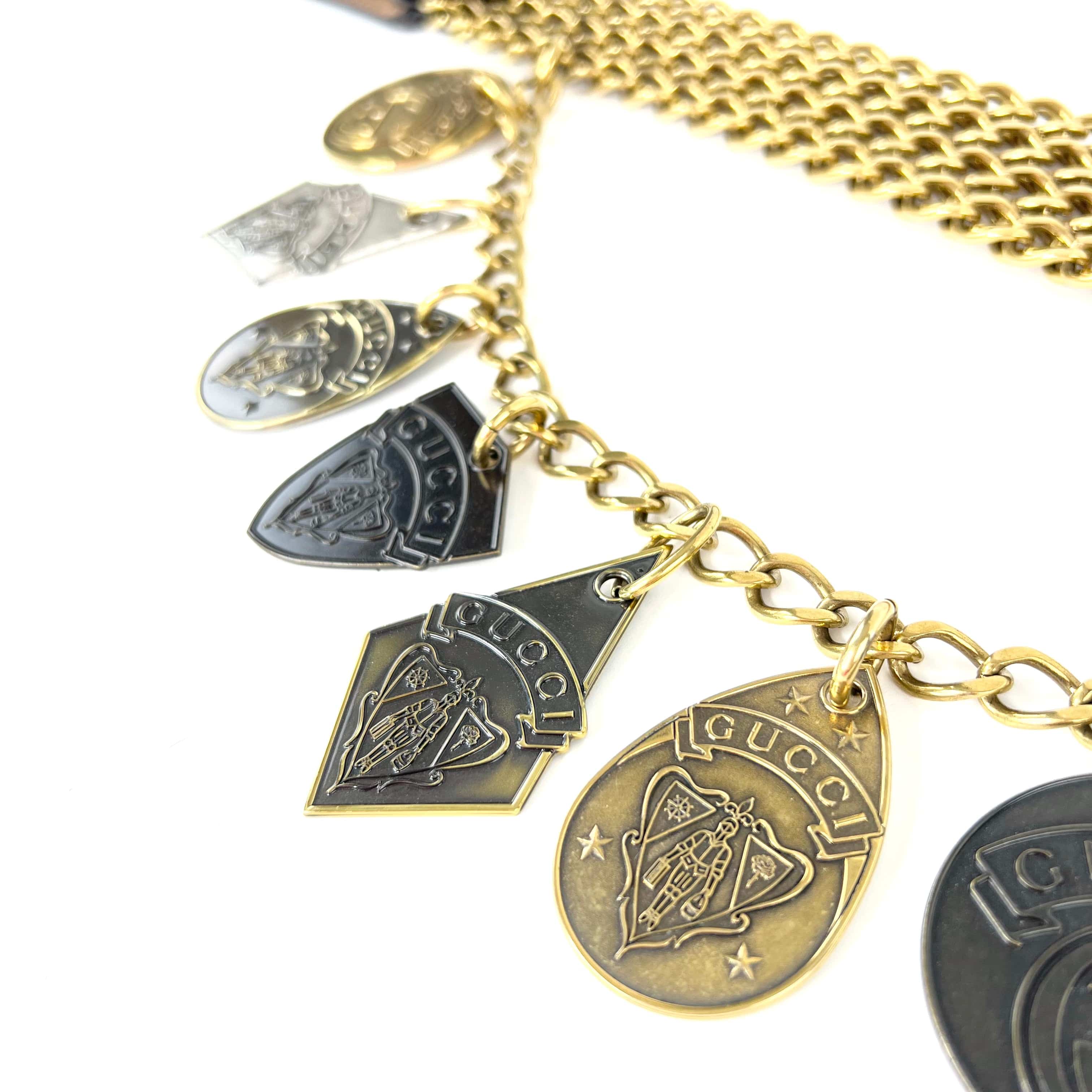Gucci Goldtoned Crest Charms Belt
